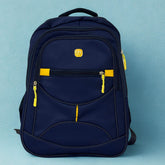 Navy blue backpack with yellow zippers on a light blue background