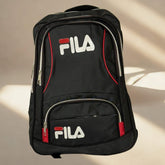 Black FILA backpack on a beige background