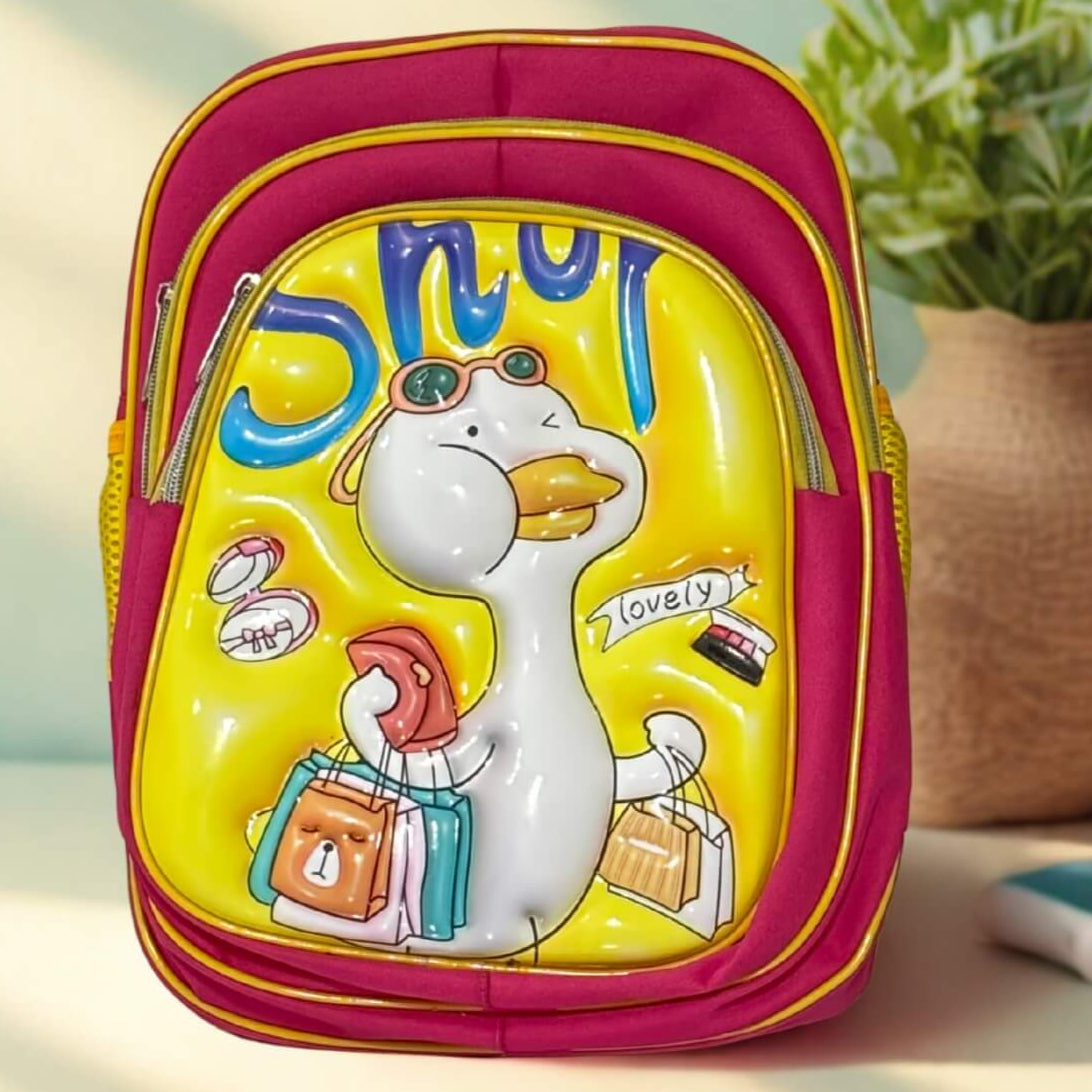 Colorful children's backpack with cartoon design on a light surface with a plant in the background