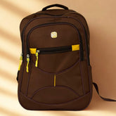 Brown backpack with yellow accents on a beige background