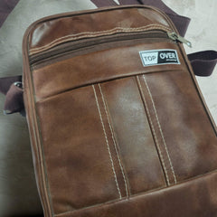 Vertical crossbody messenger bag