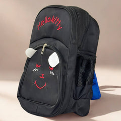 Black backpack with a cartoon face design and 'Hello Kitty' text on a beige background